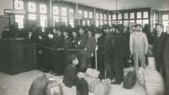 Immigrants at Ellis Island, 1910 | Photo by <a href=%40nypl517b-5.html New York Public Library</a> on <a href=grayscale-photo-of-a-group-of-immigrants-with-bags-inside-mivrrlse4bic09e-5.html   